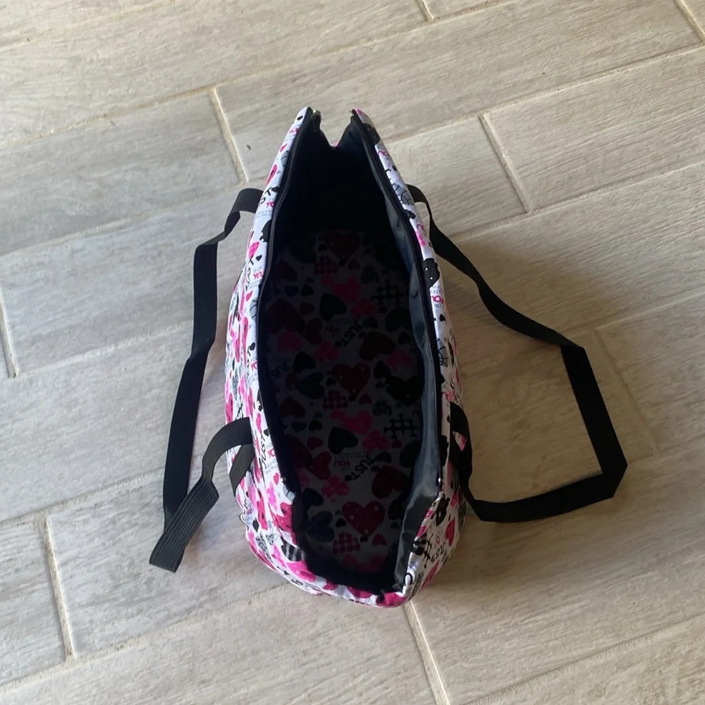 Pet Carrier.10.5”tall x 20”wide x 9”Deep. Long straps. Removable bottom. Zipper